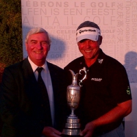 Ivor Robson and Open champion Darren Clarke with the trophy in Dubai